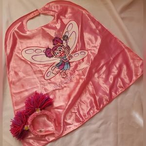 Abby Caddaby cape and headband from sesame place . Official park merchandise